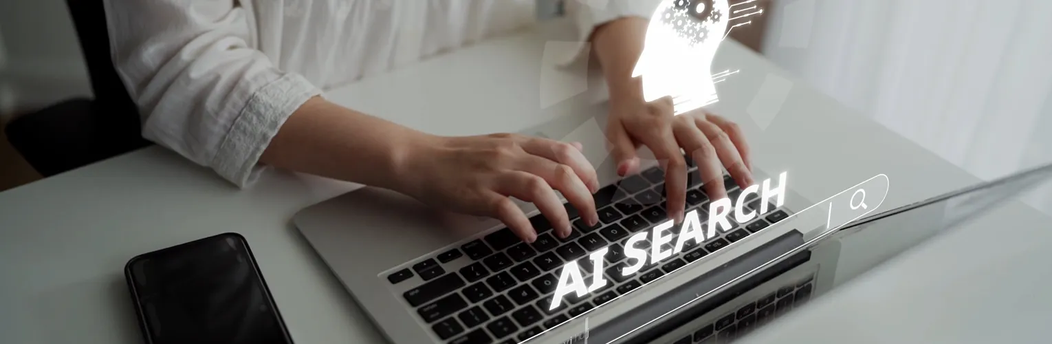 A woman searching using AI on her laptop