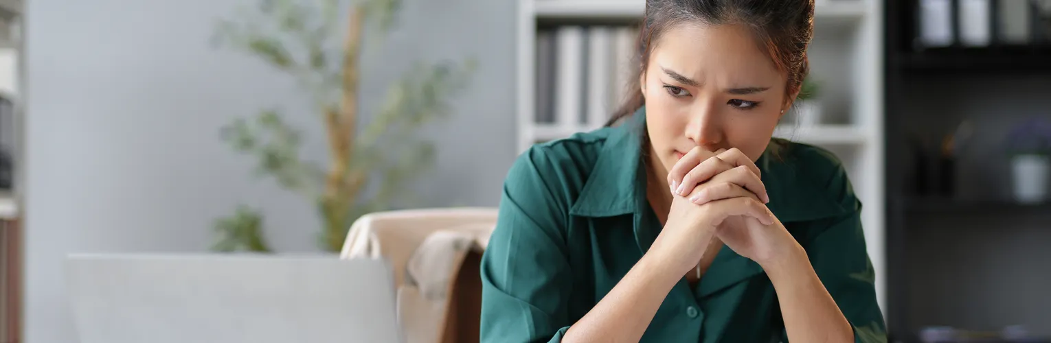 Woman reviewing Google Ads performance