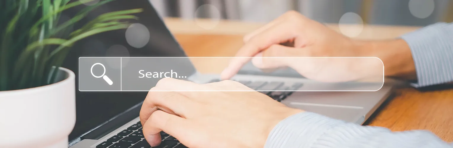 Google user searching for information on his laptop